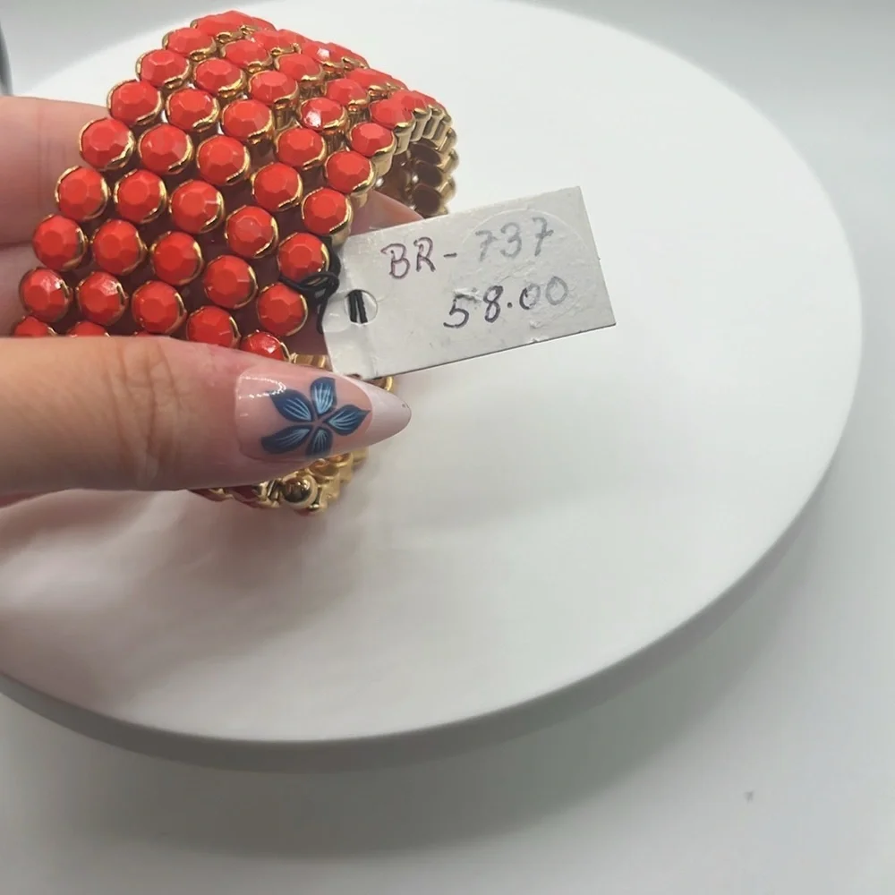1350. Cara New York Gold and Orange Wraparound Bracelet